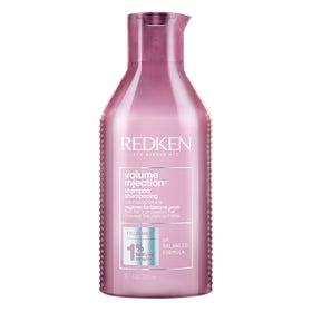 Redken bottle front packaging showcasing product and lift benefits