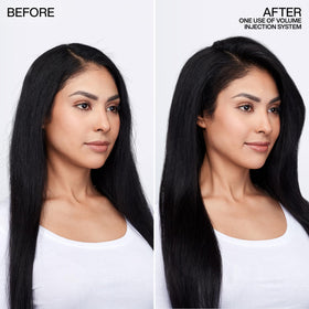 Redken conditioner being applied in shower demonstrating detangling benefit