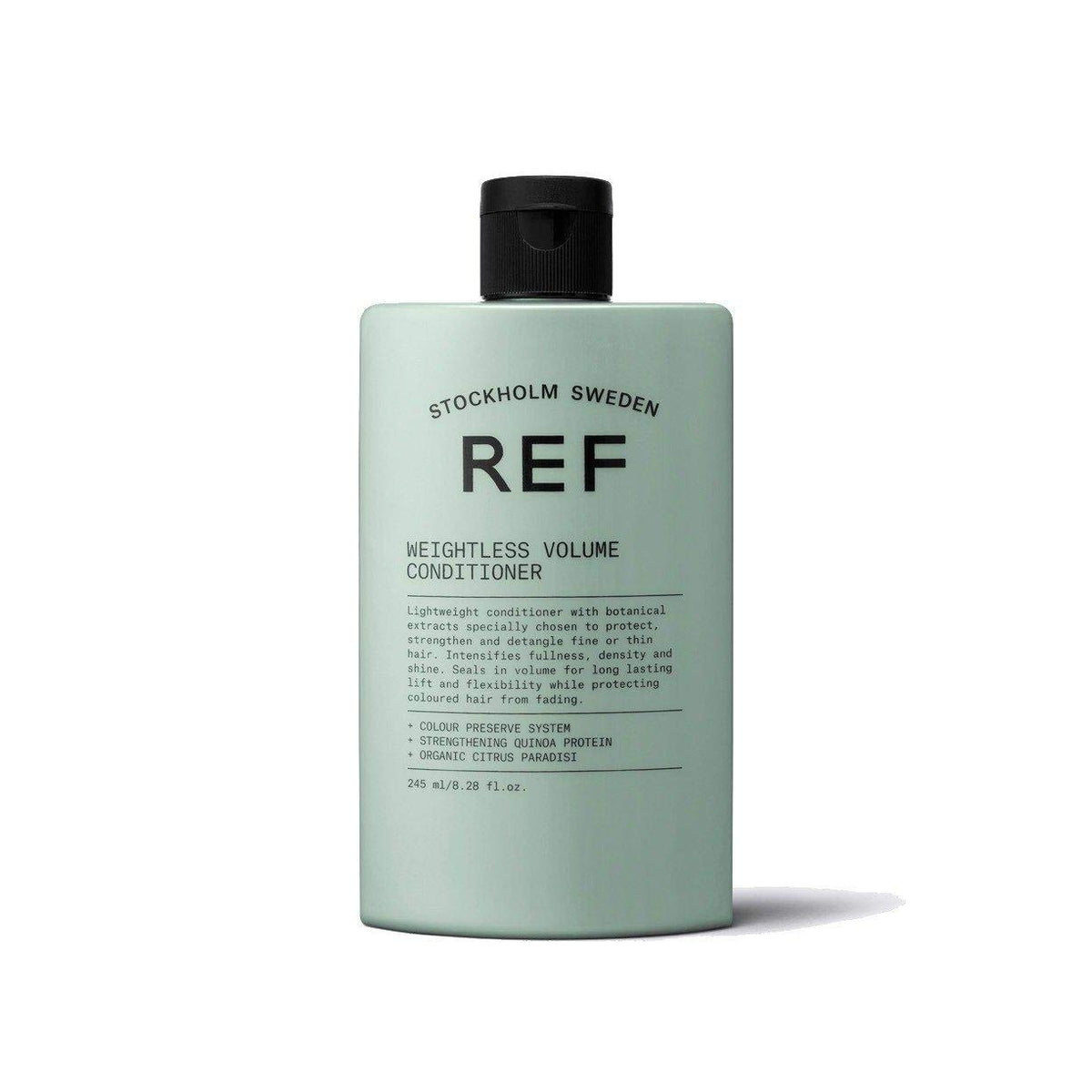 REF conditioner being applied to mid-lengths delivering easy detangling and lift
