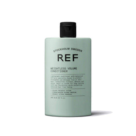 REF conditioner being applied to mid-lengths delivering easy detangling and lift