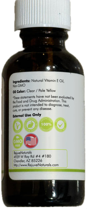 Olives and RejuveNaturals oil bottle to show plant-based d-alpha tocopherol source