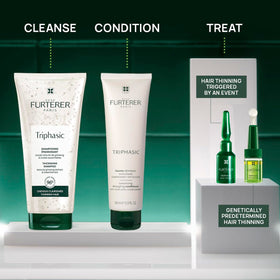 René Furterer bottle beside hand showing product size and travel-friendly benefit
