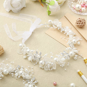 Retrowavy close-up of rhinestones and pearls highlighting craftsmanship