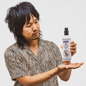 REUZEL used by barber in chair showing professional finish and quick styling benefit