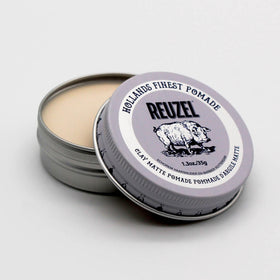 REUZEL texture close-up highlighting clay formula for flexible, matte hold