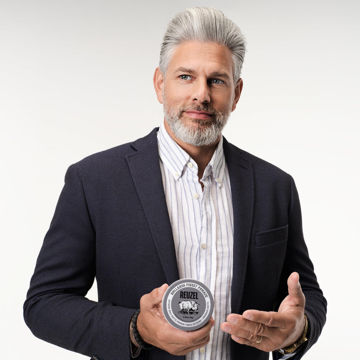 REUZEL on a dresser in lifestyle scene showing everyday grooming convenience