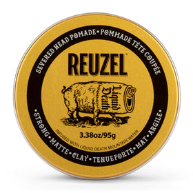 REUZEL Severed Head front jar showing branding and size, clear product identity