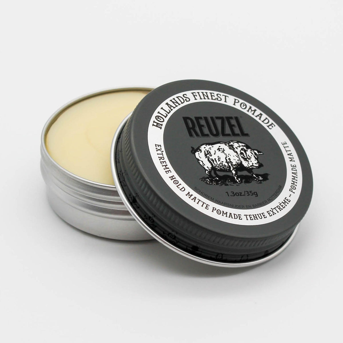 REUZEL pomade texture close-up demonstrating dry matte finish and easy-to-apply consistency