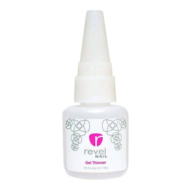Revel Nail 0.5oz bottles beside a ruler for size comparison and travel-friendly convenience