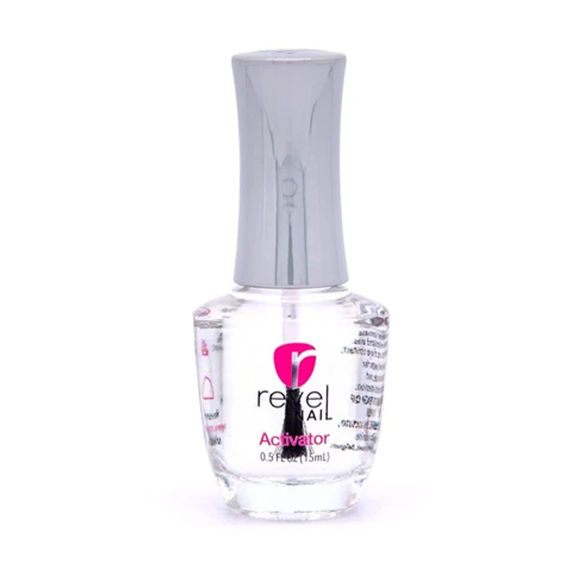 Revel Nail liquids being applied to nails on a model hand demonstrating smooth, controlled application