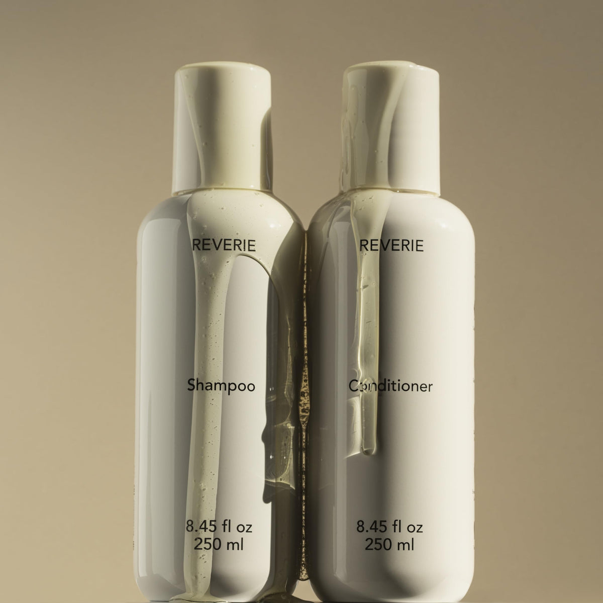 REVERIE conditioner in use under shower delivering slip for detangling