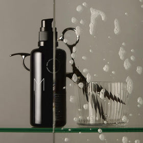 Reverie lifestyle bathroom shot showing daily routine uplift and scent