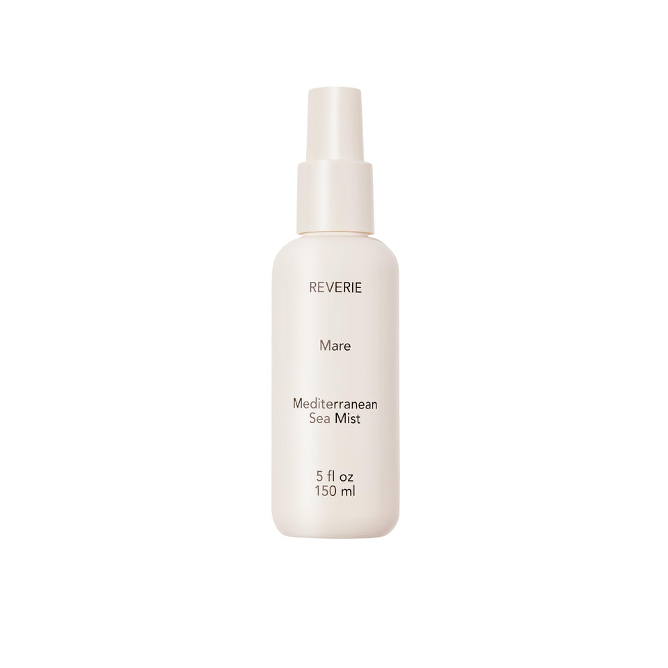 REVERIE bottle front packaging showing clean sea mist benefits