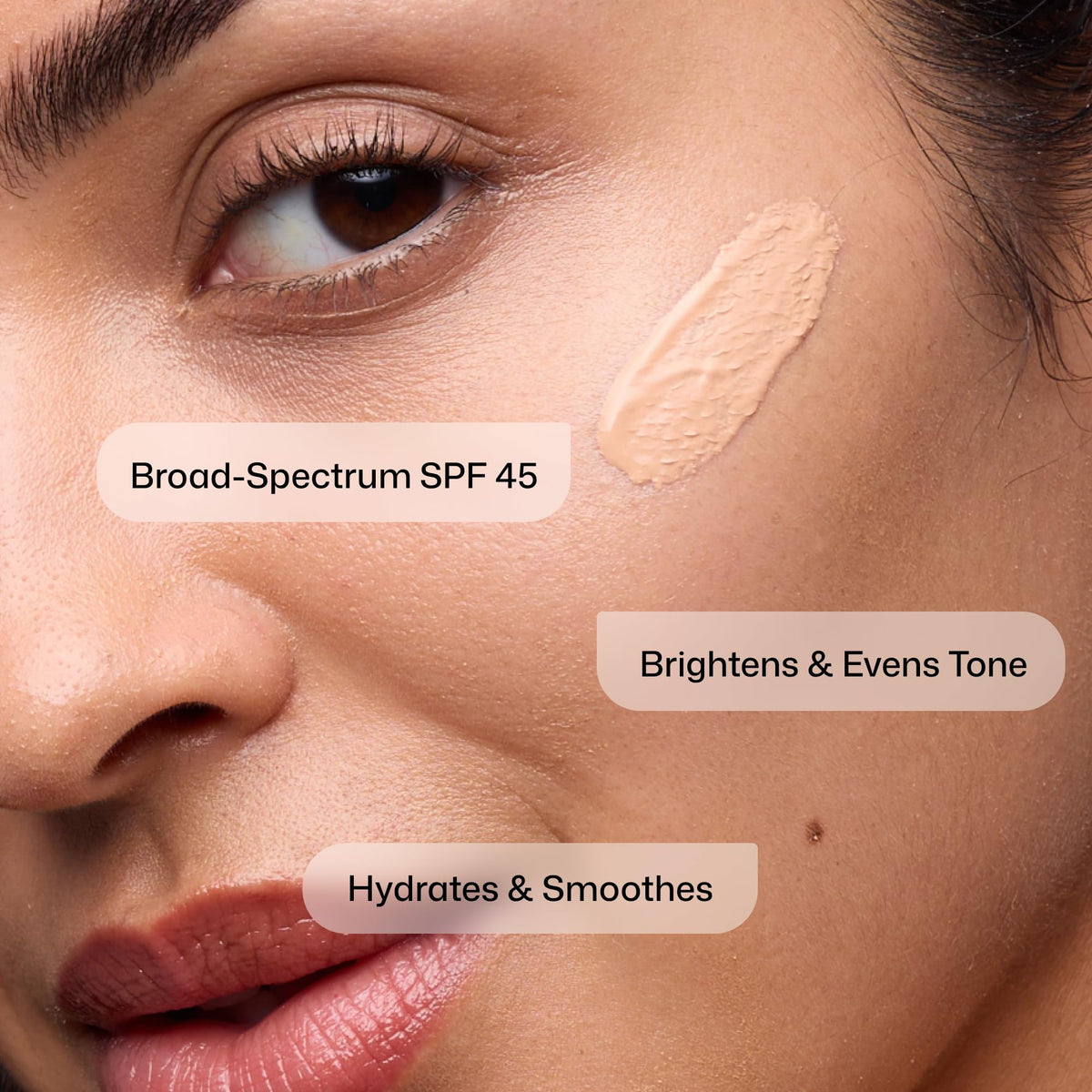 Revision Skincare swatch on hand showing sheer tint and even coverage