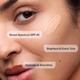 Revision Skincare swatch on hand showing sheer tint and even coverage
