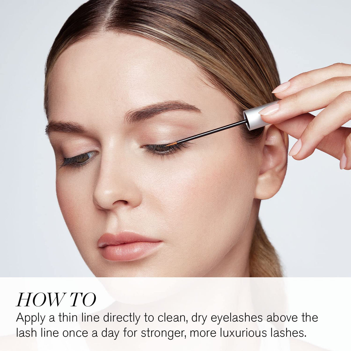 RevitaLash applicator close-up on lash line demonstrating precise application benefit