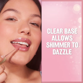 REVLON Bronze Spark gloss styled on a vanity with accessories showing everyday glam benefit