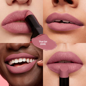 Revlon lipstick swatch on arm showing vivid pigment and matte texture