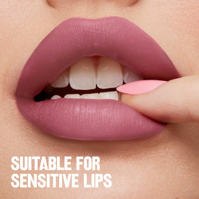 Label detail on Revlon ColorStay tube emphasizing vegan formula and award recognition