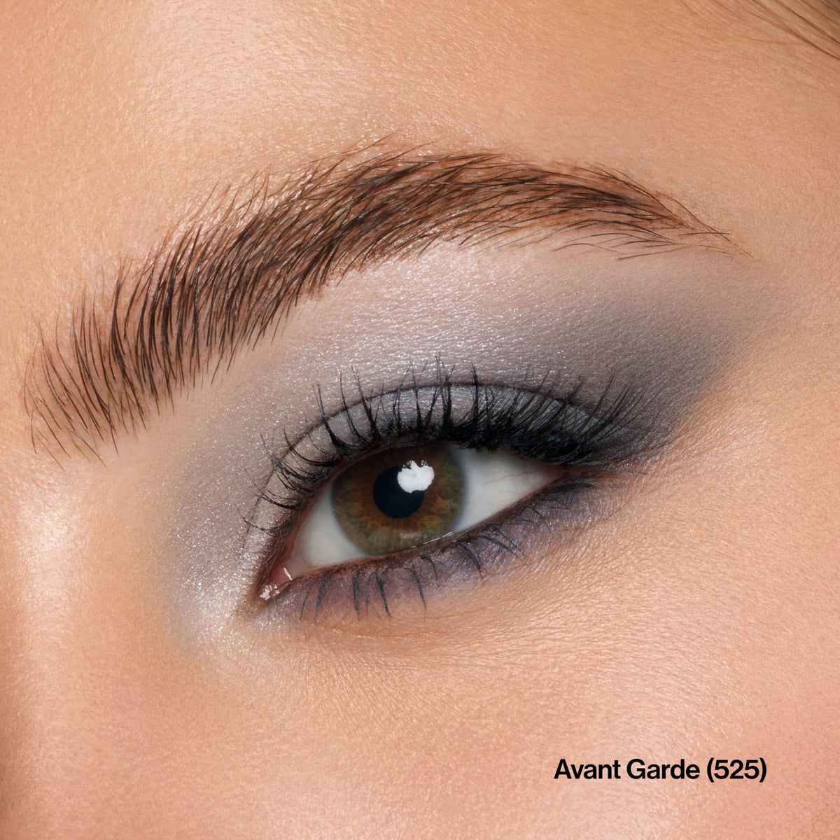 REVLON close-up of shimmer top coat highlighting reflective texture and glow