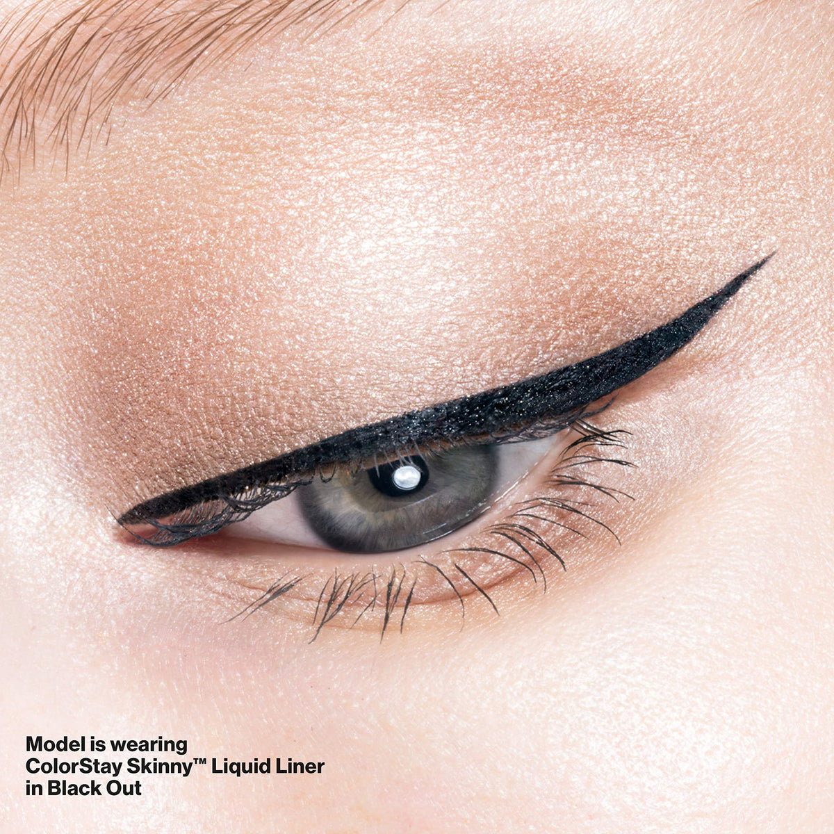 Revlon model showing clean cat-eye flick created with the skinny tip