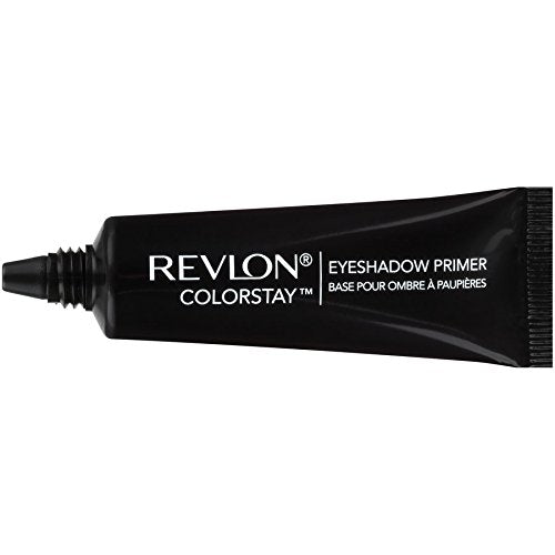 Revlon primer beside ruler and shadow palette showing compact 0.33 oz size for travel