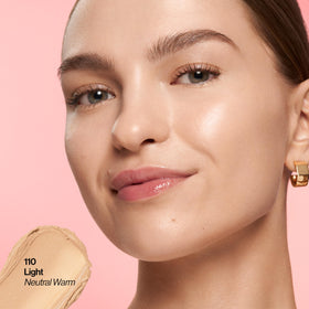 Revlon glimmer stick applied on cheek demonstrating natural coverage and radiant effect