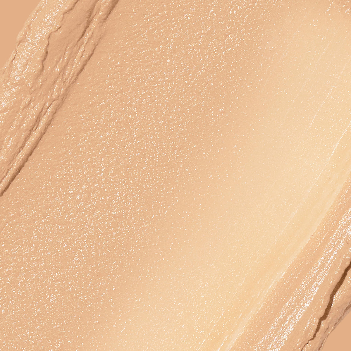 Revlon glimmer stick texture close-up highlighting creamy, blendable finish and hydration