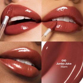 Revlon PhotoReady applicator close-up with gloss on tip, demonstrates easy precise application and smooth glide