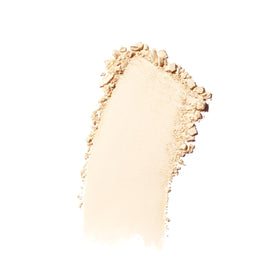 Close-up of Revlon PhotoReady powder texture highlighting fine-milled blurring action