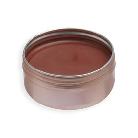 Revolution Balm Glow applied to cheek and lip showing natural flushed color and hydration