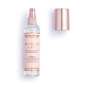 Revolution Beauty mist spraying onto skin, provides matte hold with hydration
