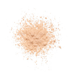 Revolution Beauty London open sifter top view revealing loose peach powder, easy dispensing
