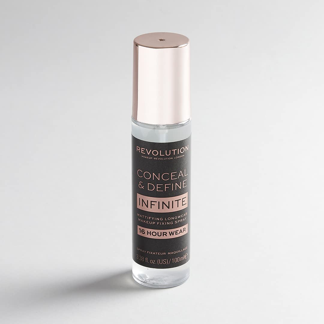Revolution Beauty London Infinite Fixing Spray in use on model showing quick application and prolonged makeup hold
