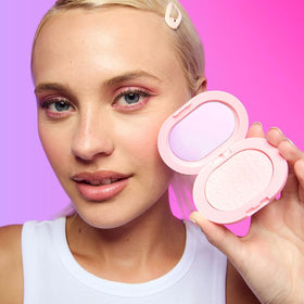Revolution Beauty London included puff and brush demonstrating easy on-the-go touch-ups