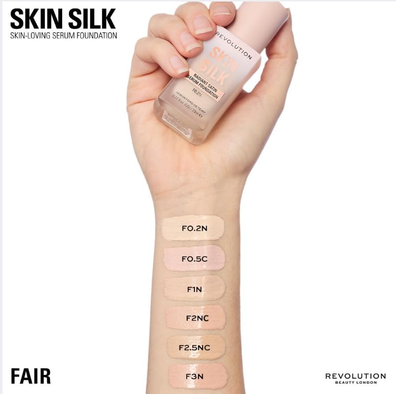 Revolution Skin Silk poured on hand, shows blendable coverage and finish
