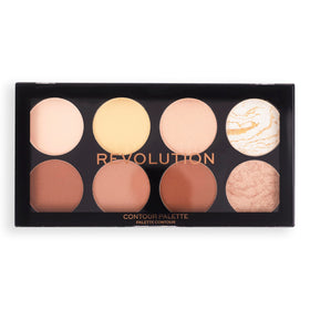 Revolution Beauty London model applying contour with brush for natural dimension and definition