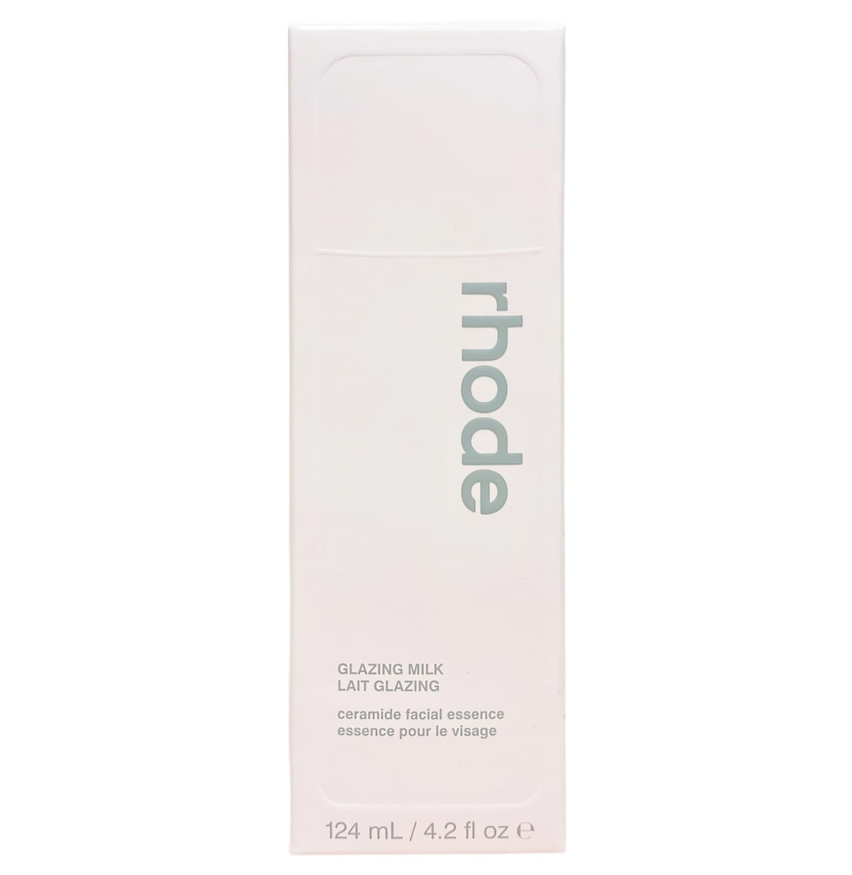 Rhode applying essence to hand to show absorption and prepping benefit