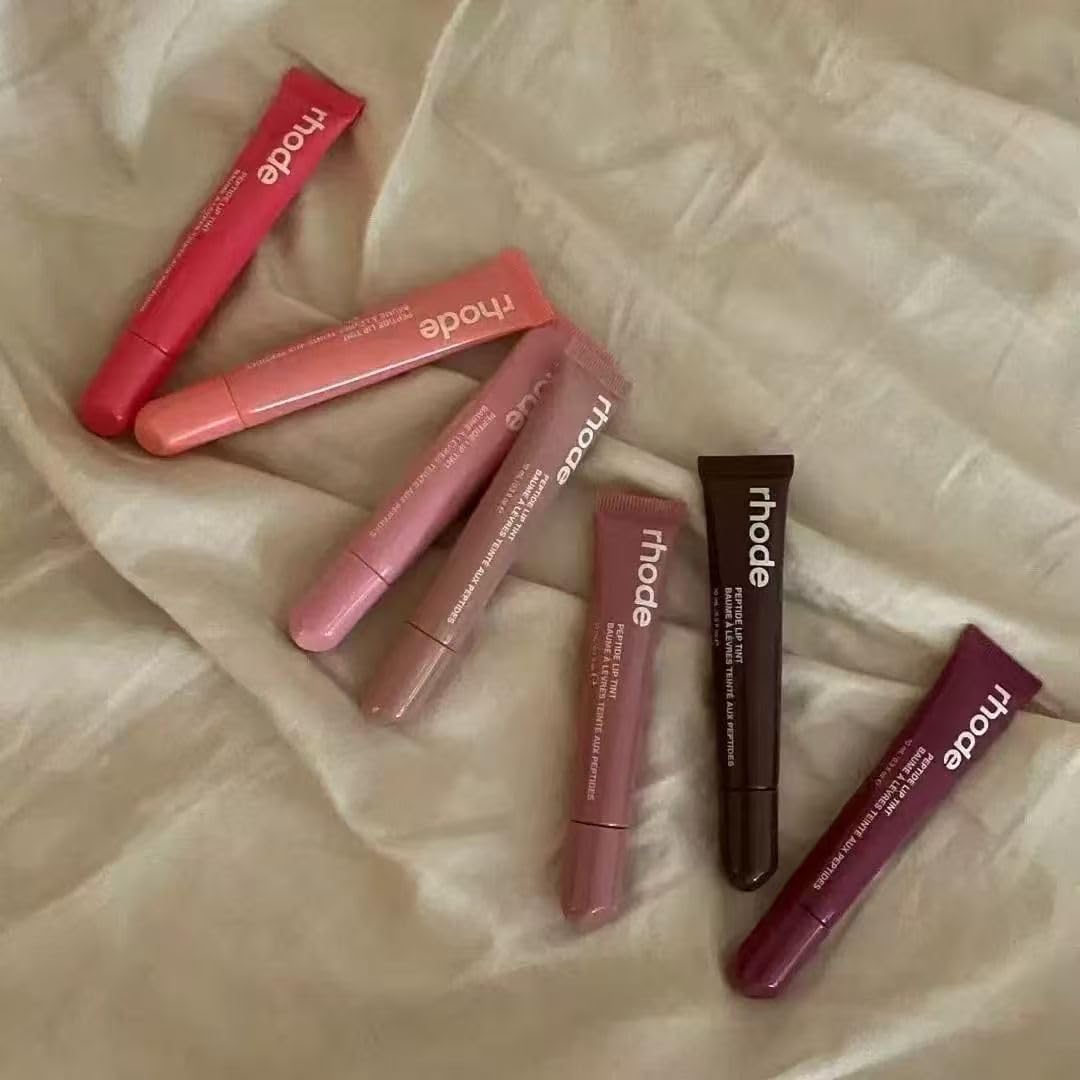 Rhode swatch on arm revealing sheer buildable Toast color payoff