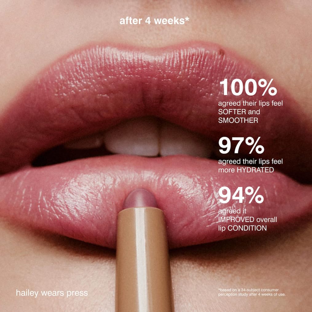 Model applying Rhode Peptide Lip Shape Press demonstrating natural, well-defined lip contour benefit