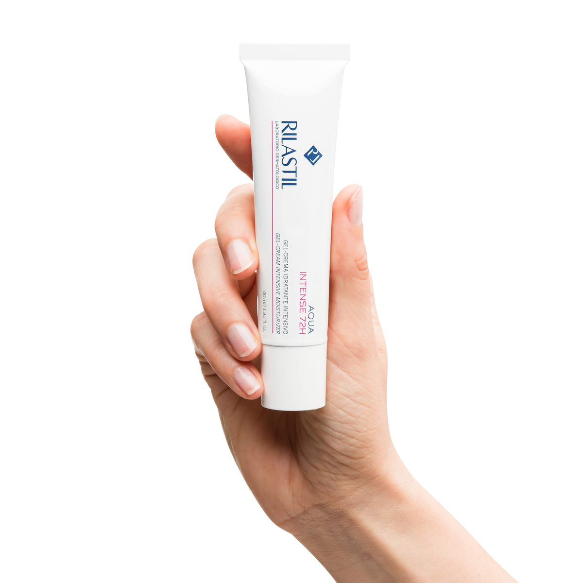 Woman applying Rilastil gel-cream to cheek for fast hydration, demonstrates non-greasy finish benefit