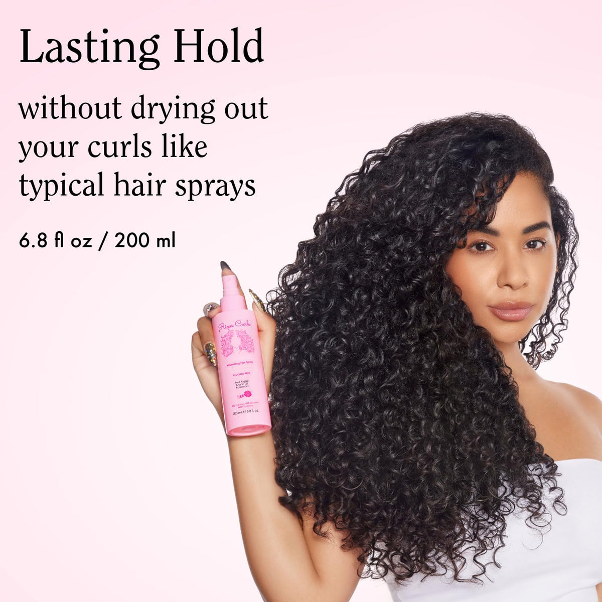 Rizos Curls nozzle close-up demonstrating fine mist spray