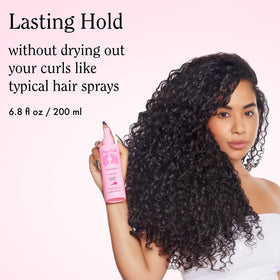 Rizos Curls nozzle close-up demonstrating fine mist spray