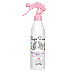 Rizos Curls front packaging showing bottle and branding with clear benefits