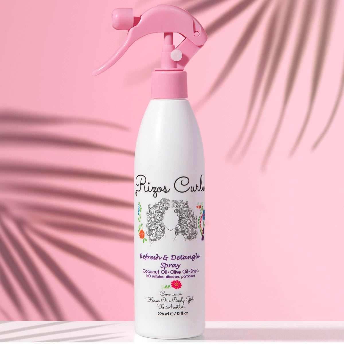 Rizos Curls texture on hand demonstrating lightweight mist and quick absorption