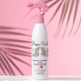 Rizos Curls texture on hand demonstrating lightweight mist and quick absorption
