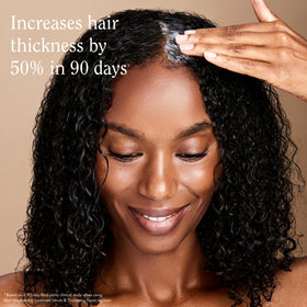 Rizos Curls being applied at the roots to lift and boost volume