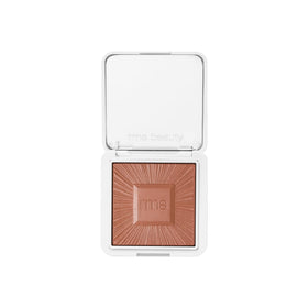 RMS Beauty compact front view showing sleek refillable case and mirror benefit