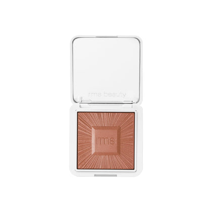 RMS Beauty compact front view showing sleek refillable case and mirror benefit