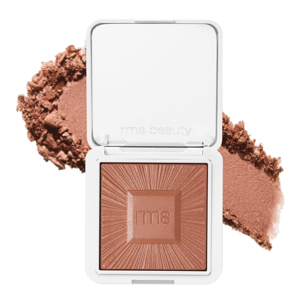 RMS Beauty compact front view showing sleek refillable design and portable benefit